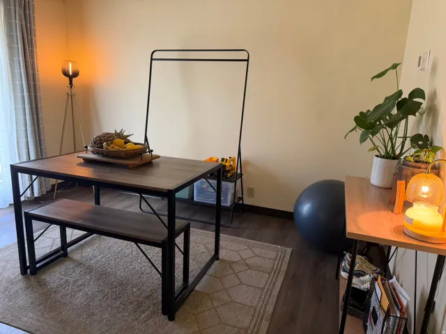 Wood-finish flooring throughout the space