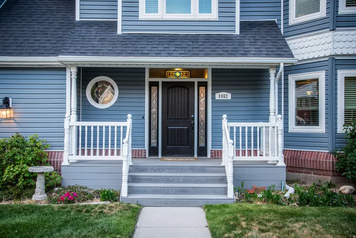 Welcoming front porch and distinctive turret