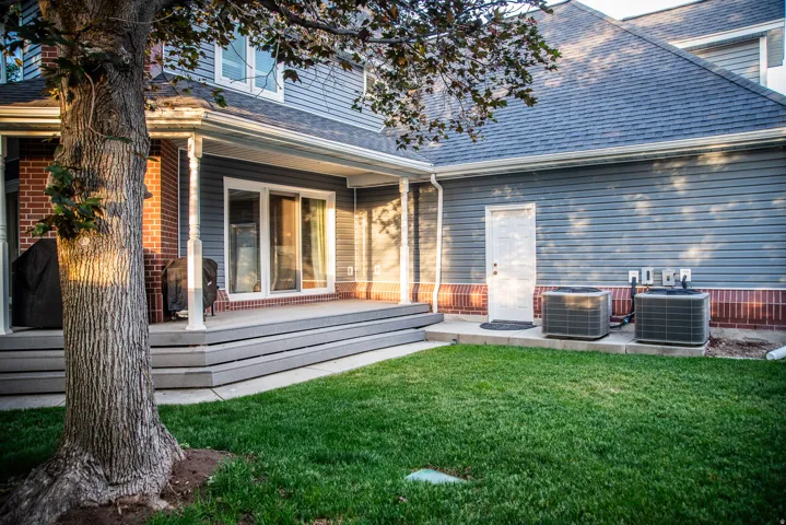 Rear exterior.  Dual air conditioning units.