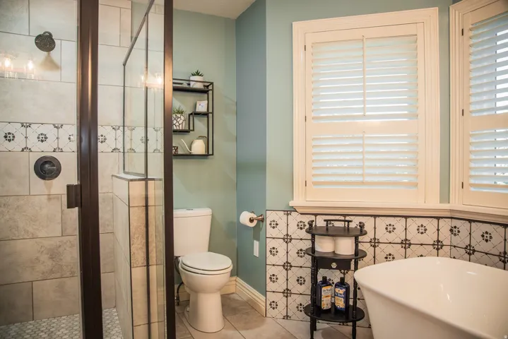 Primary bathroom. Large custom tiled shower enclosure and a huge freestanding soaking tub