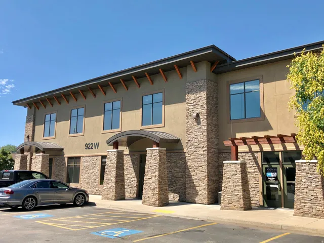Modern commercial building featuring a stone and stucco exterior