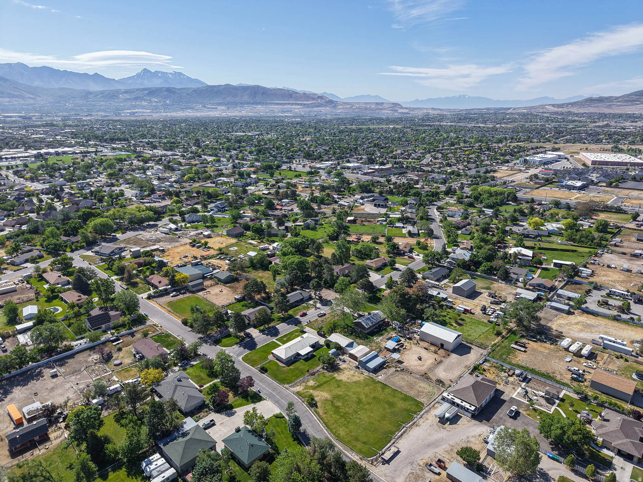 Aerial perspective showcasing a residential area with varied lot sizes