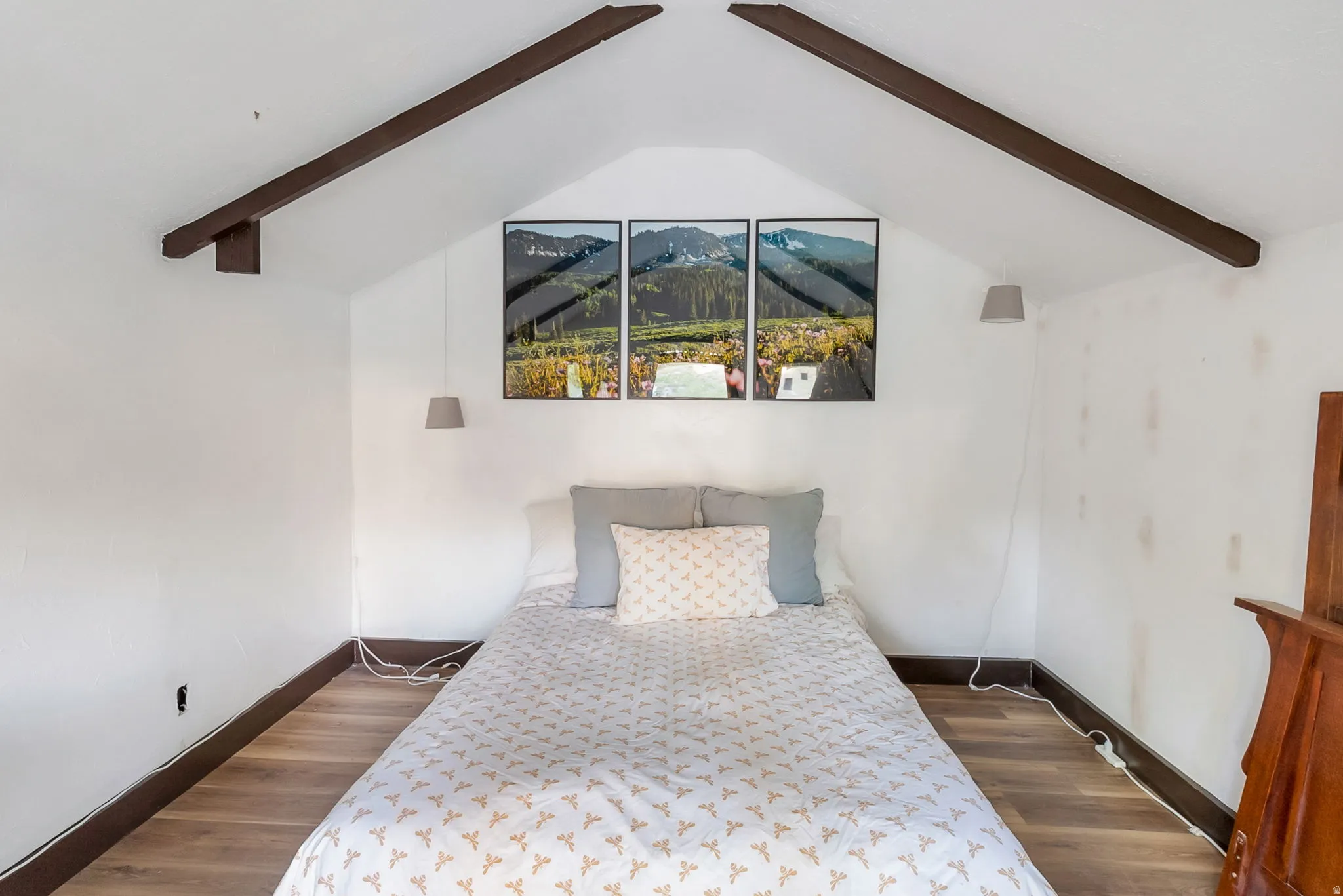 Vaulted ceiling with exposed wood beams