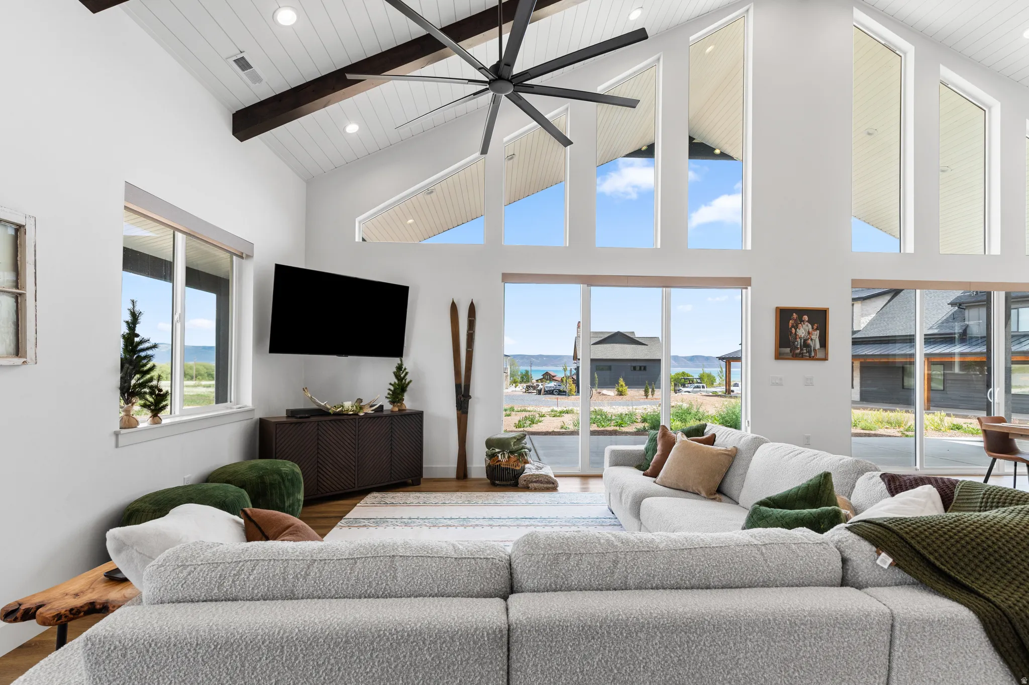 Vaulted ceiling with exposed wood beams and plank paneling