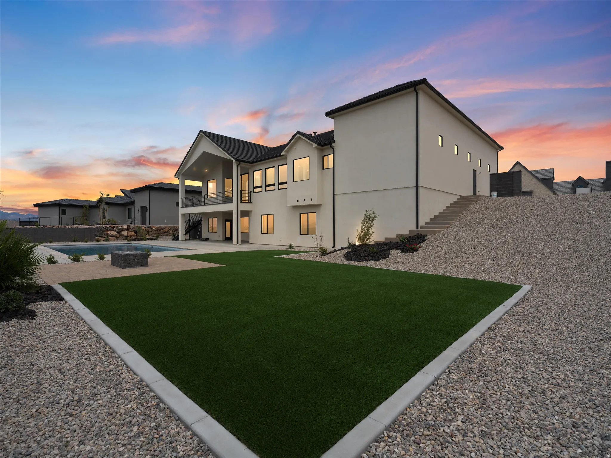 Contemporary stucco exterior with a multi-level design