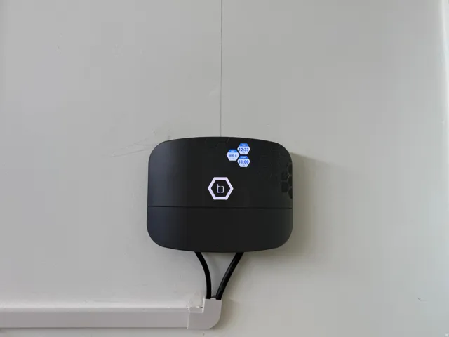 Wall-mounted smart sprinkler system featuring a digital display and can work from your phone when you're away. super upgrade and uses the secondary water for an added savings.