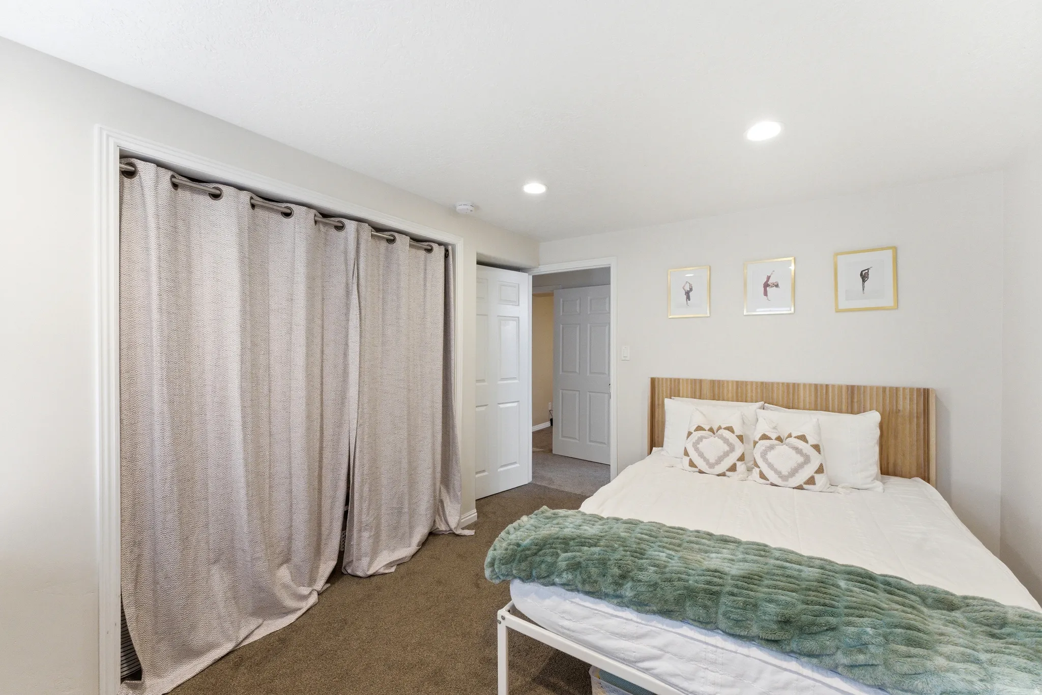 Bedroom featuring recessed lighting, a neutral color palette, and soft carpet flooring