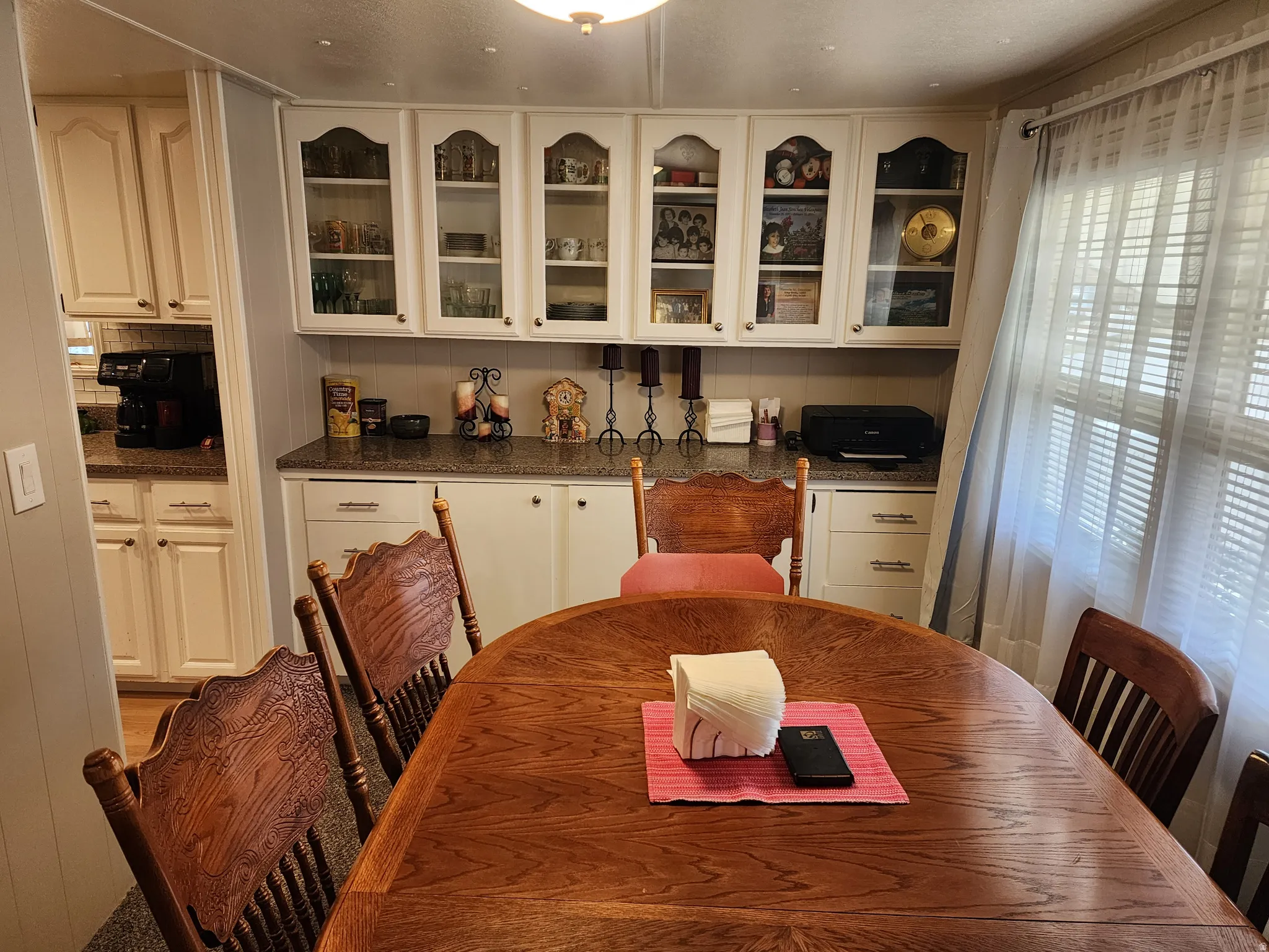 Dining area featuring a wood-finish oval table