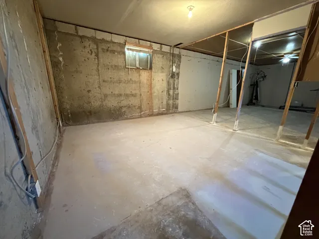 Concrete flooring with a partial concrete block wall