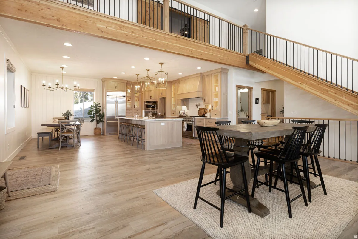 Open-concept living area with wood-finish flooring throughout