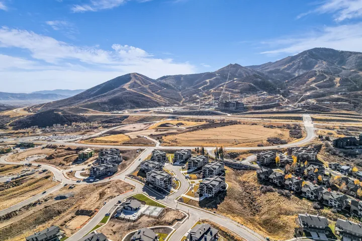 Aerial perspective showcasing a residential area with varied housing types