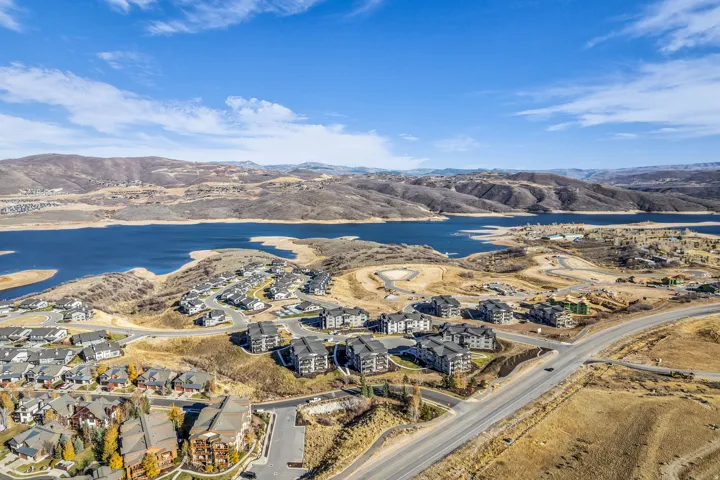 Aerial perspective showcasing extensive waterfront presence and a developed residential community
