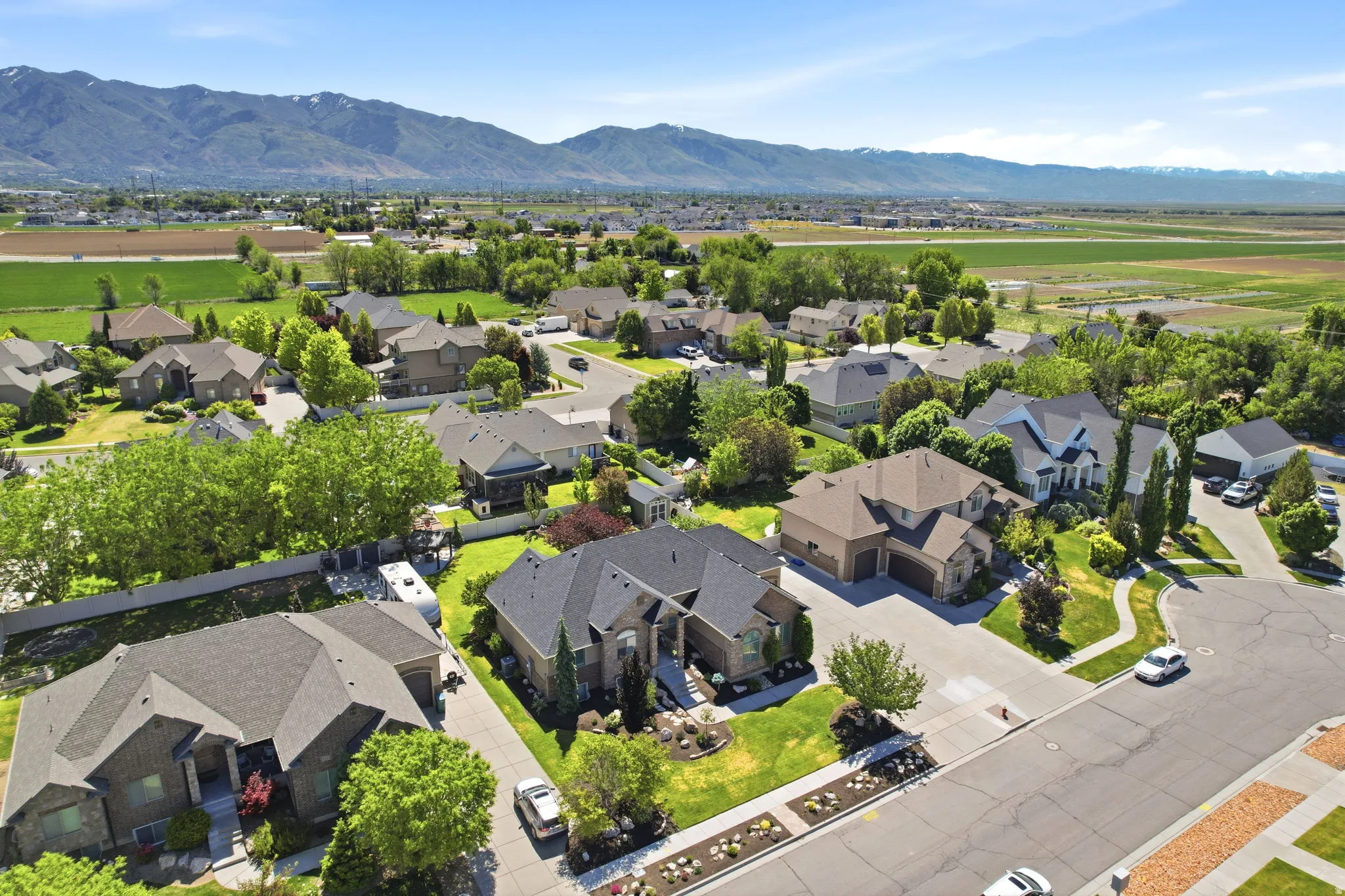 Expansive residential neighborhood featuring diverse architectural styles and mature landscaping