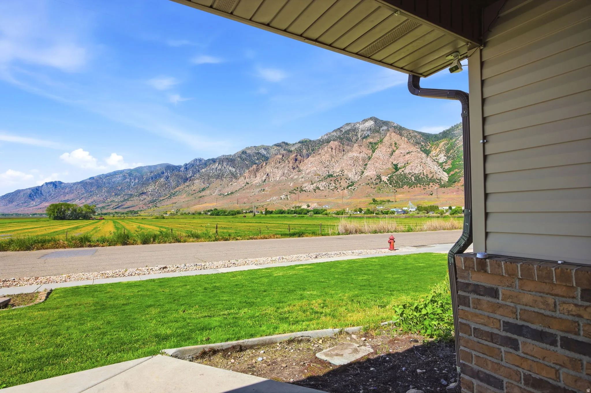 Mountain backdrop with expansive agricultural fields