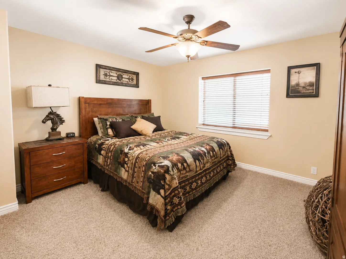 Neutral-toned walls complement plush carpeting