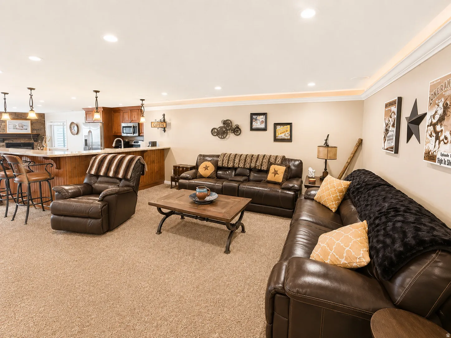 Open-concept living area featuring plush carpeting and recessed lighting