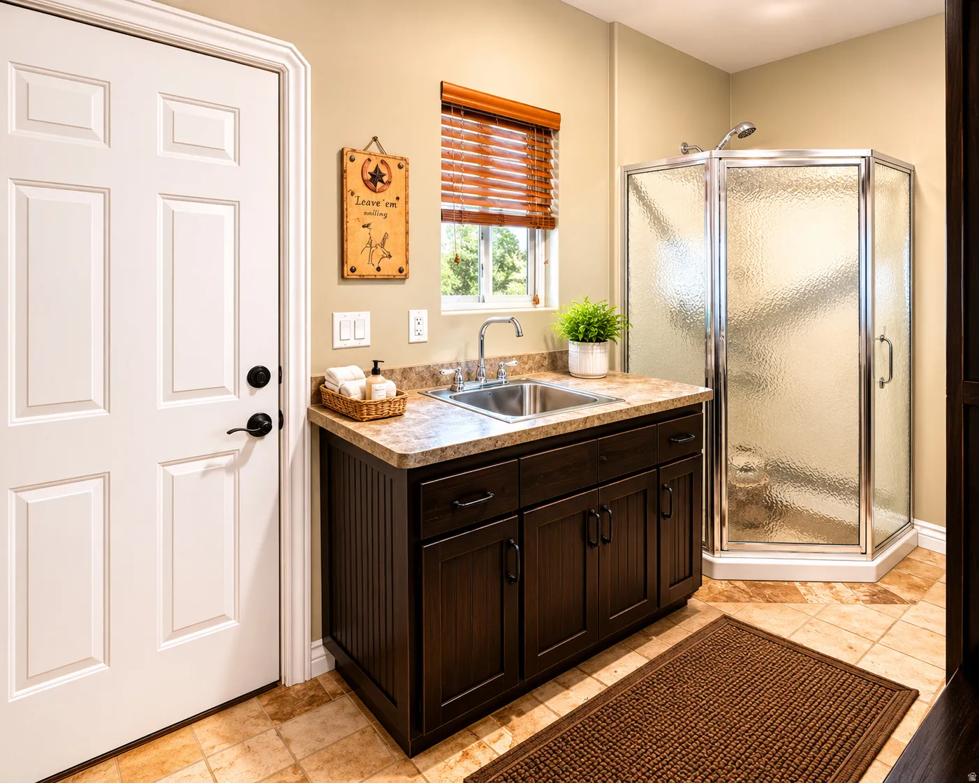 Corner shower with textured glass enclosure and chrome hardware
