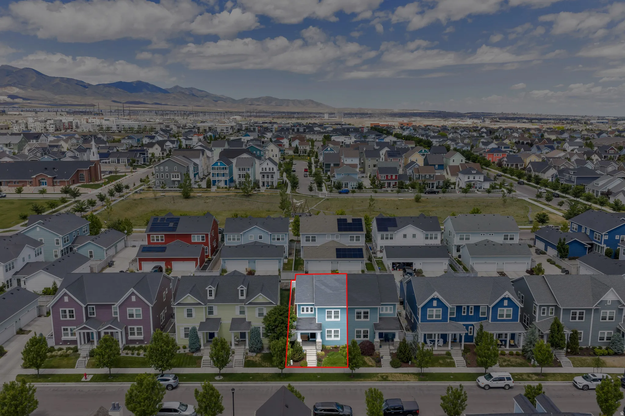 Aerial perspective showcasing a modern residential neighborhood with consistent architectural styling