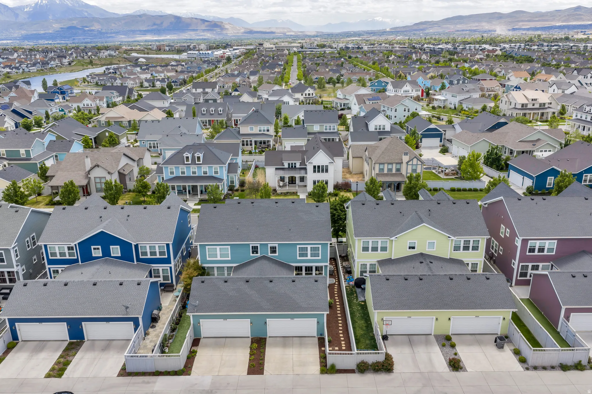 Aerial perspective showcasing a residential neighborhood with diverse housing styles