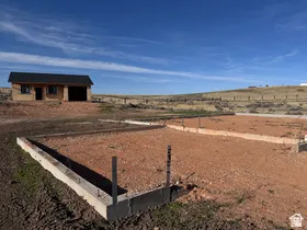 Concrete foundation for new construction on a spacious lot