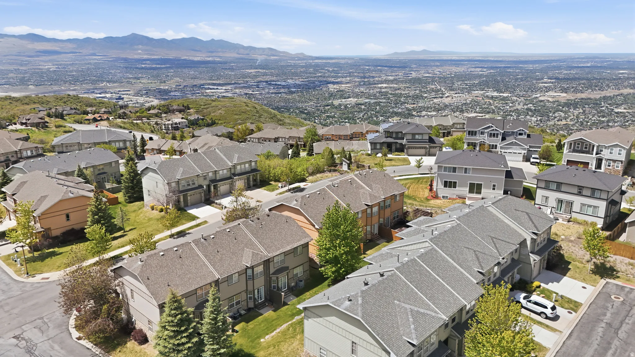 Sprawling residential development featuring a diverse range of multi-story homes with varied architectural styles