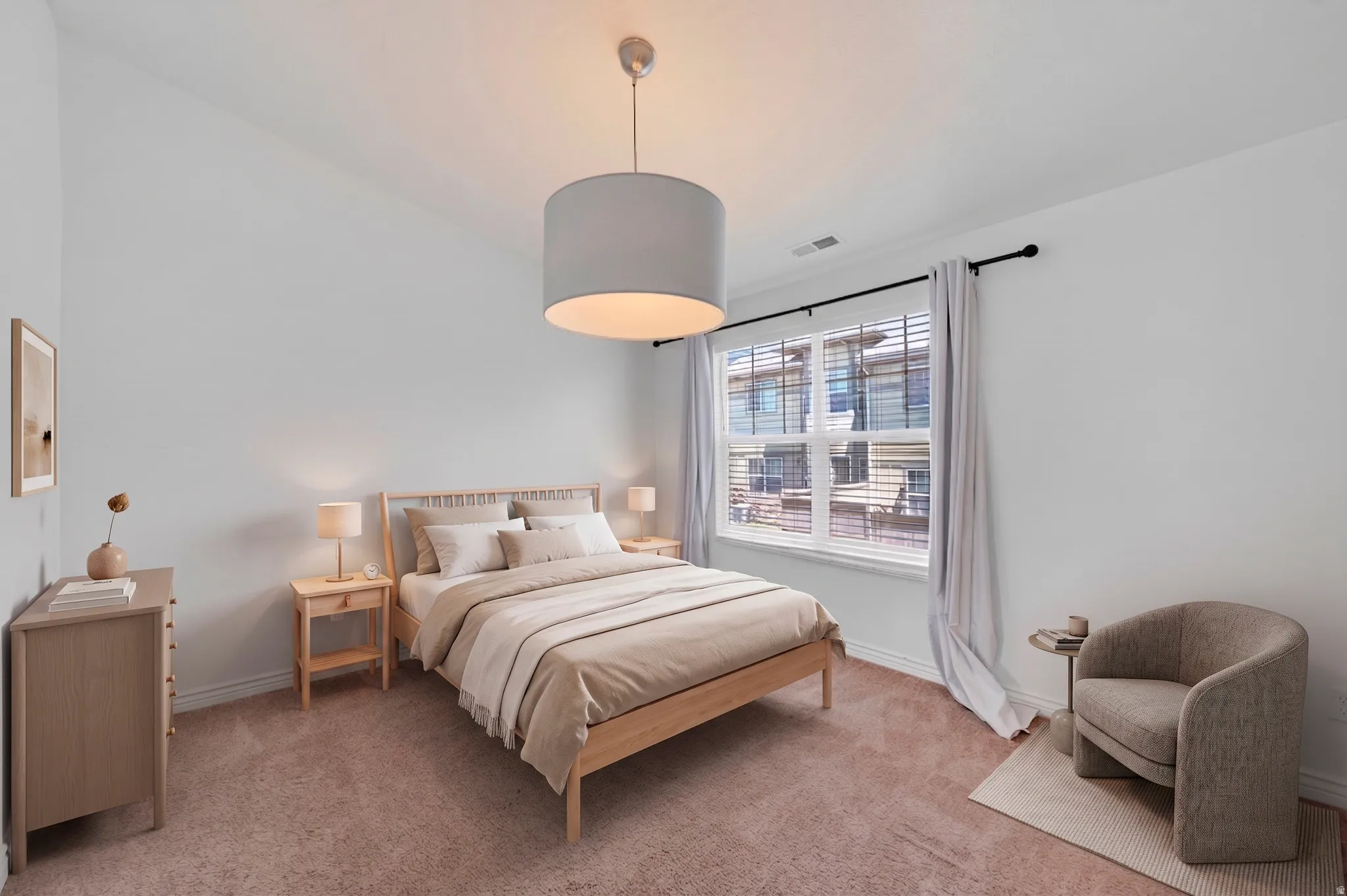 Carpeted room featuring a large window with blinds and drapes, a drum pendant light fixture, and a sloped ceiling