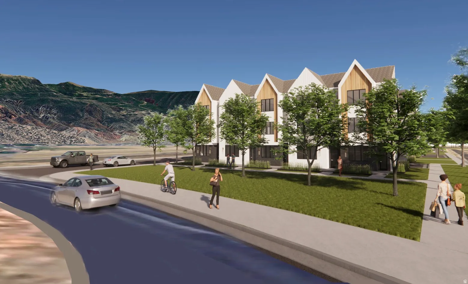 Modern townhome-style residences featuring light-toned siding and natural wood-look accents