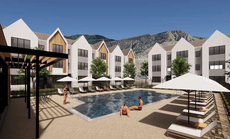 Resort-style swimming pool featuring a paver patio surround, multiple lounge chairs with umbrellas, and a shaded pergola area