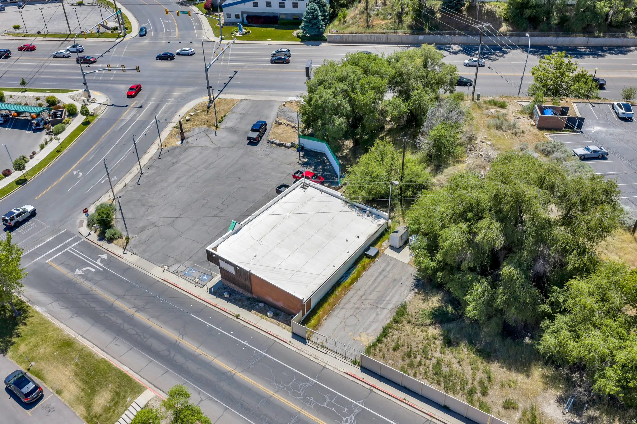 Commercial building featuring a flat roof and brick exterior