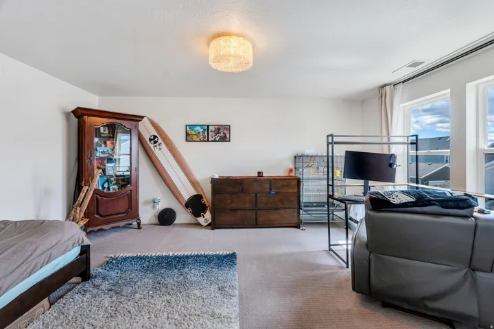View of carpeted bedroom