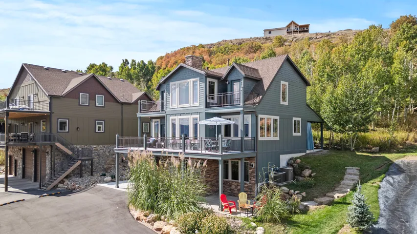 3 levels with lower built into the hillside for a private backyard setting.