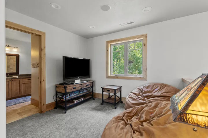 2ND  level family room/den/loft, with balcony over looking the great room.  2 bedrooms and full bathroom off this family room area.