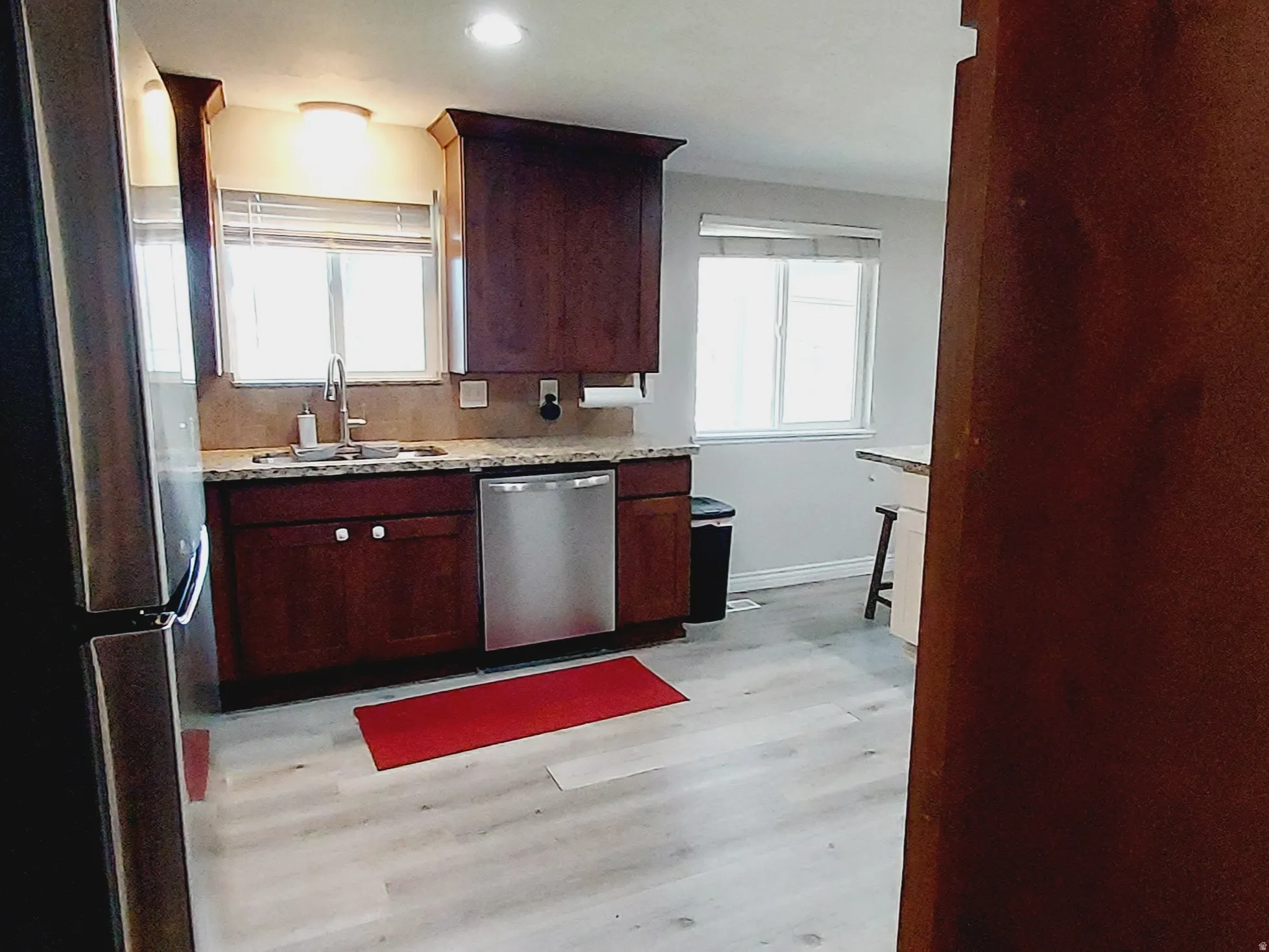 Kitchen with stainless steel appliances.