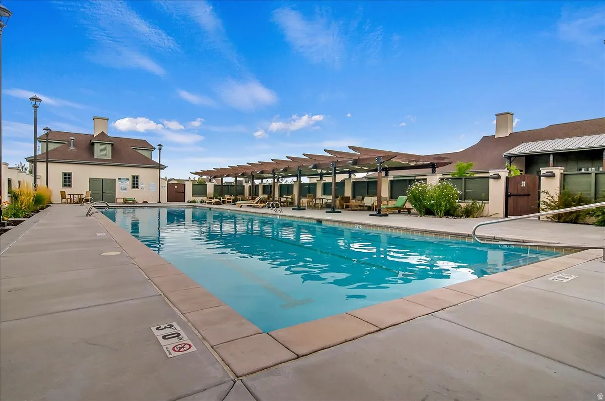 Rectangular swimming pool with concrete decking