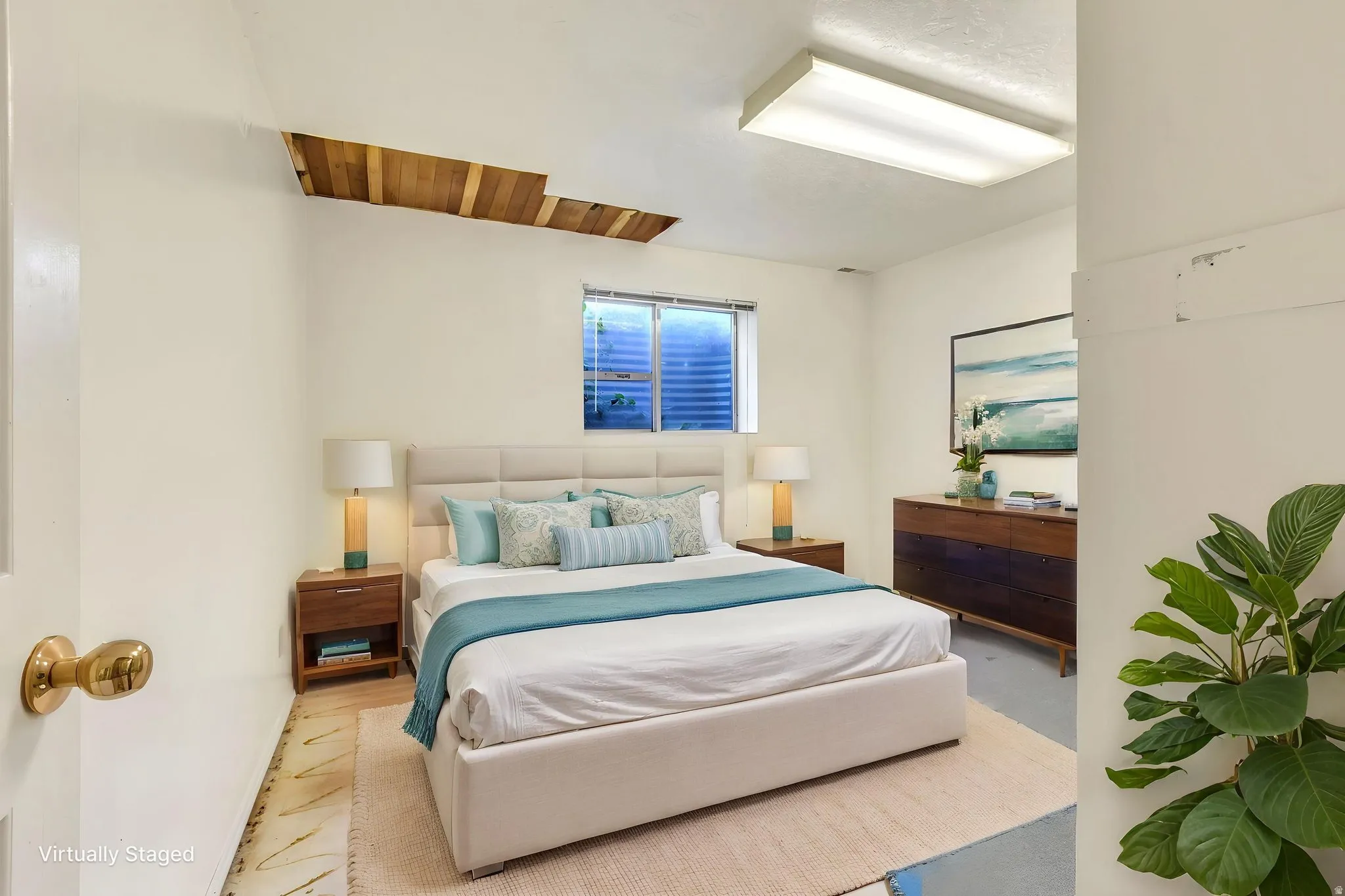 Virtually Staged -Spacious room featuring a window with blinds, wood-finish flooring, and a portion of a wood-paneled ceiling