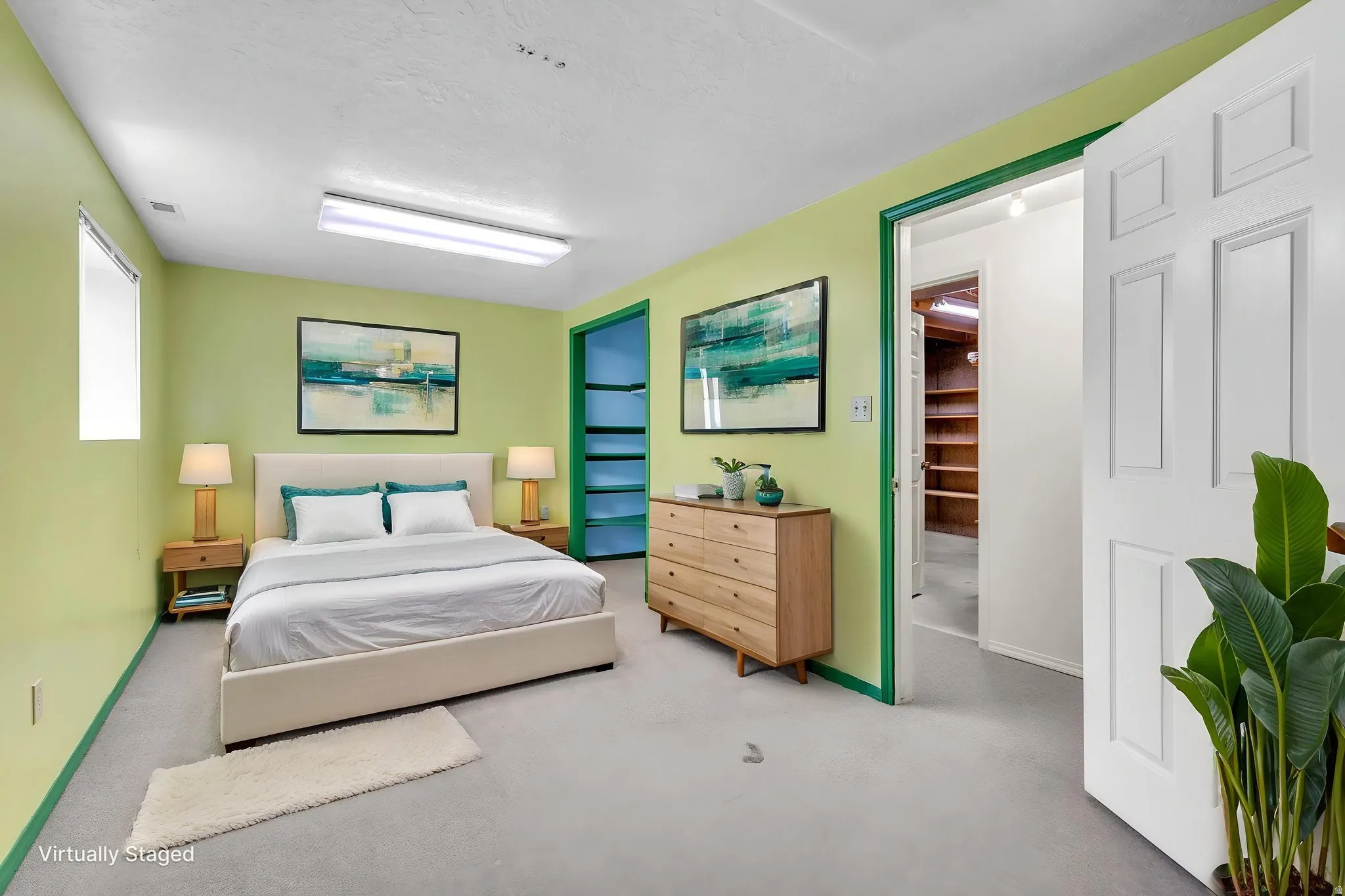 Virtually Staged -Bedroom with light green walls and light grey carpet