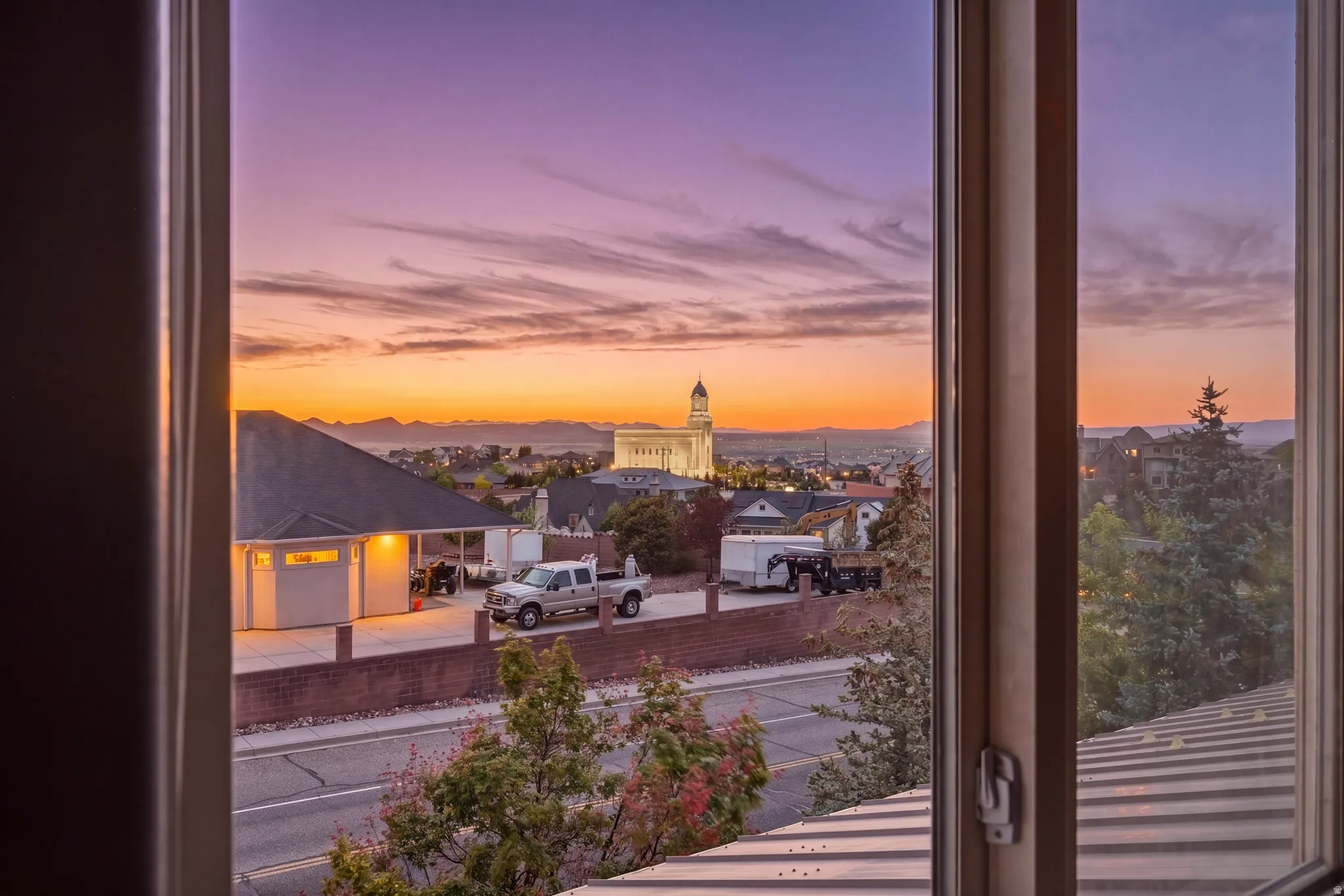 Expansive window framing a panoramic cityscape