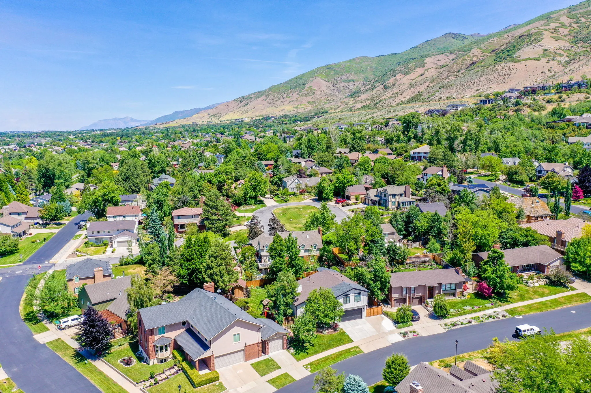 Aerial perspective showcasing a residential neighborhood with varied architectural styles