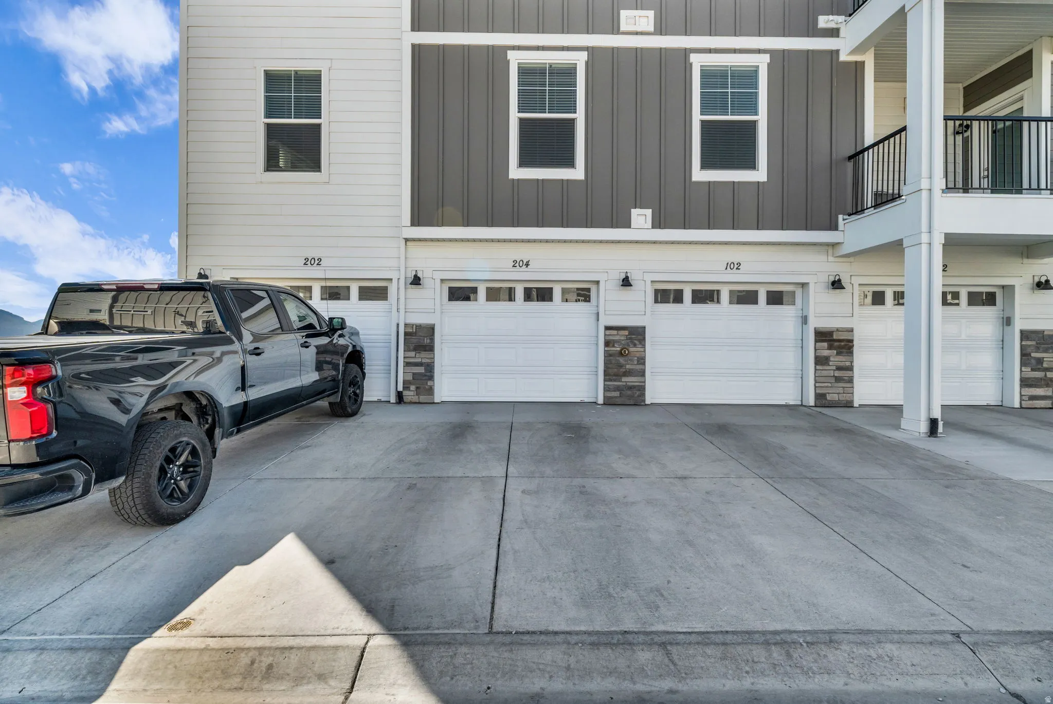 Exterior facade featuring vertical and horizontal siding