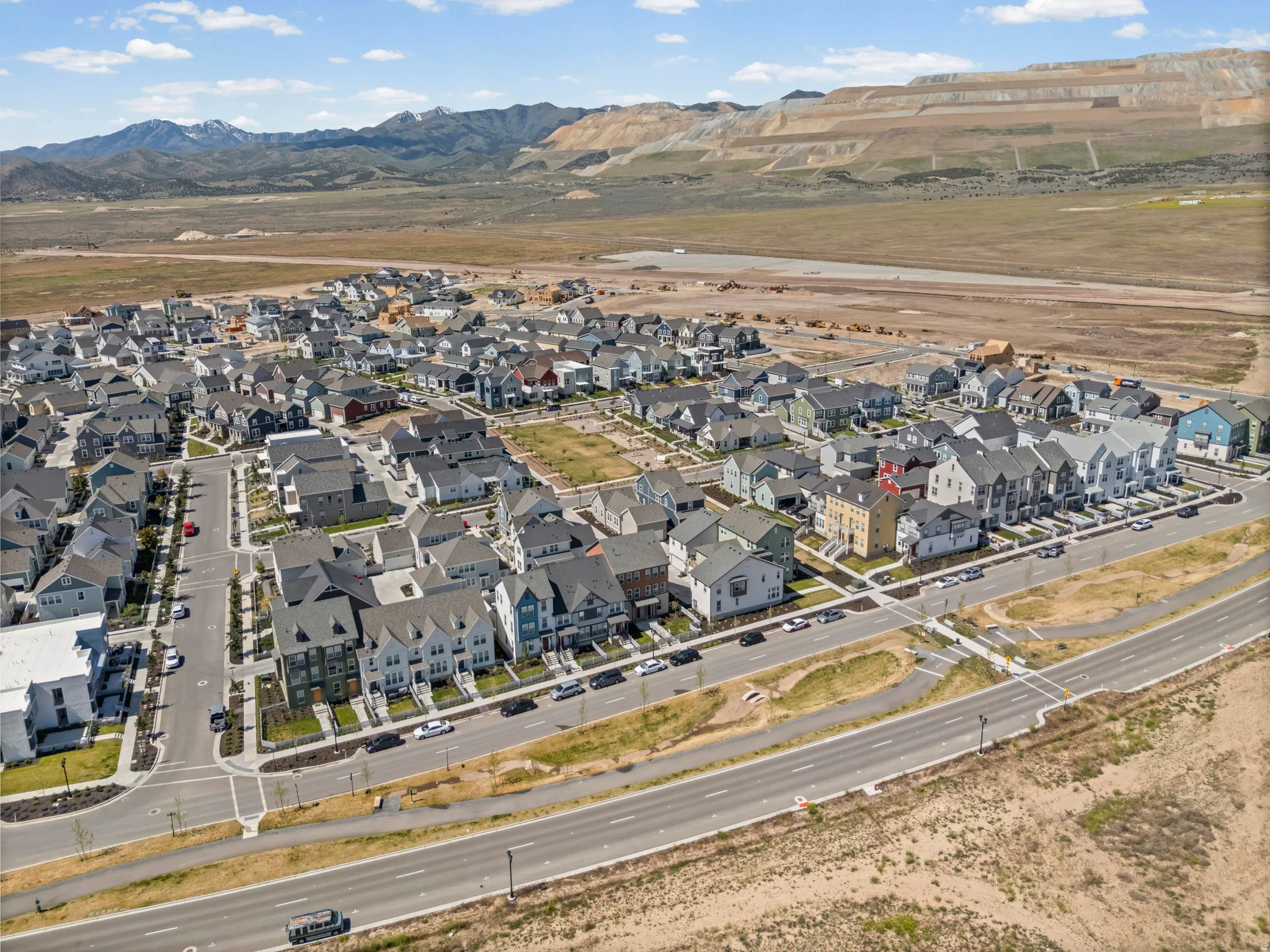 Expansive aerial perspective showcasing a residential development with diverse architectural styles