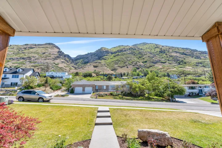 Expansive mountain backdrop featuring varied terrain and abundant greenery