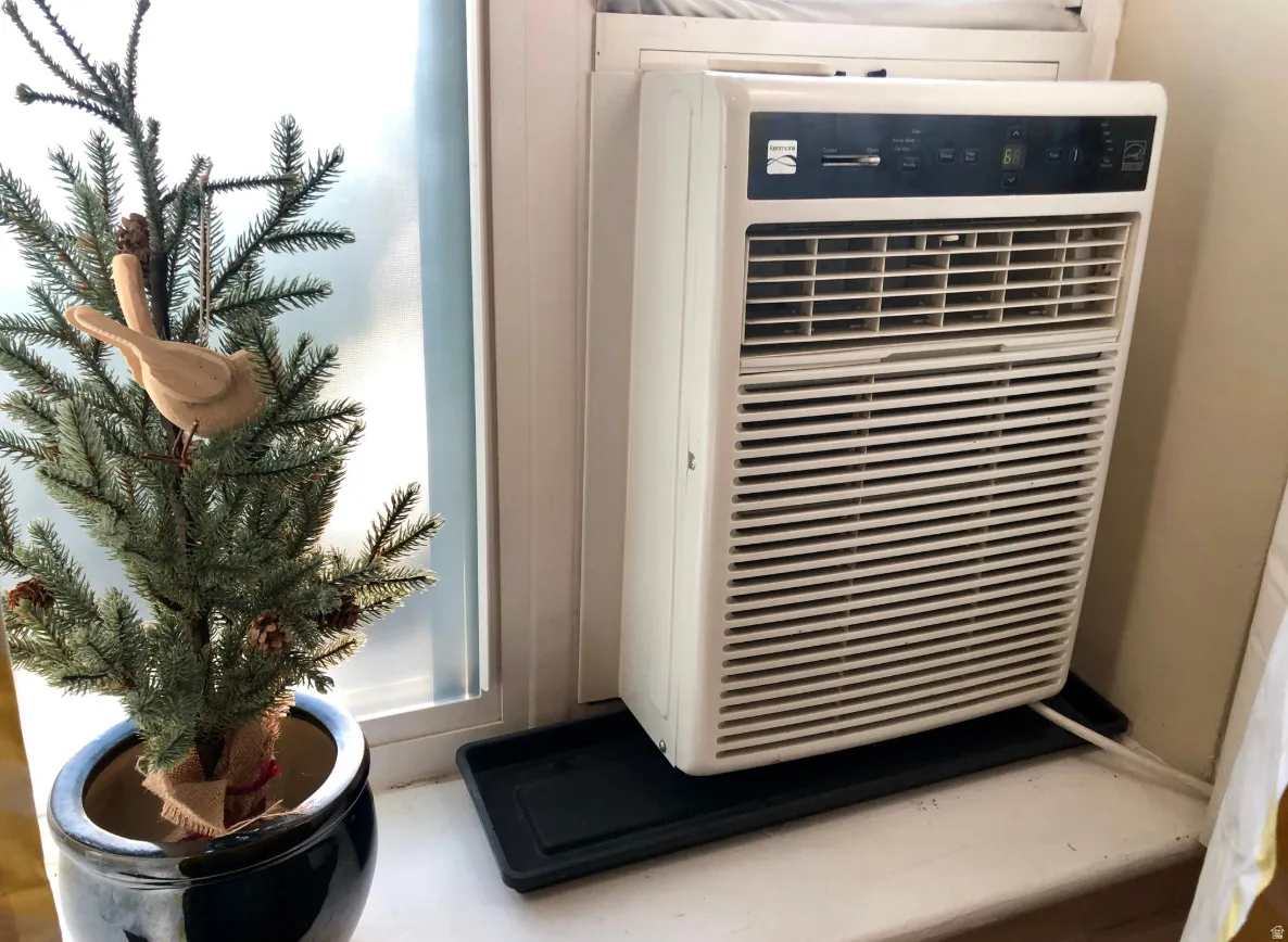 Window-mounted air conditioning unit with digital controls