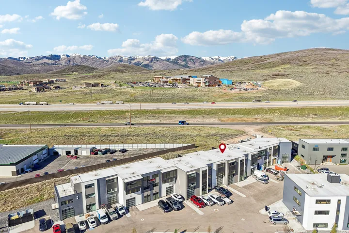 Modern industrial-style buildings with multiple garage bays