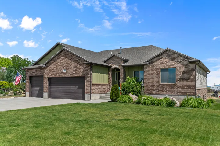Brick exterior with complementary green siding accents