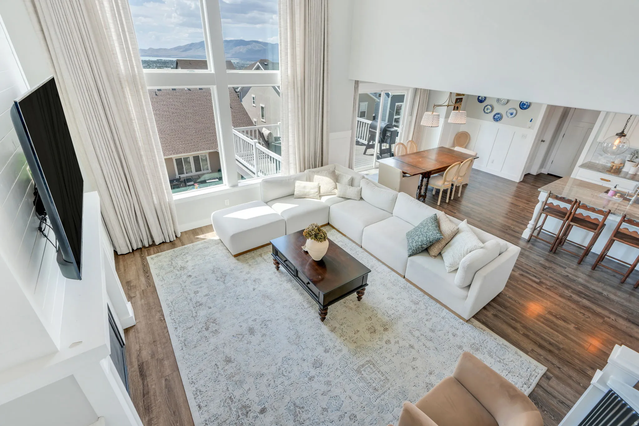 Great room with soaring ceilings and expansive window wall