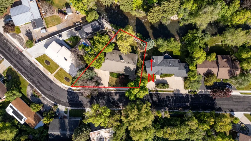 Aerial view showcasing property boundaries outlined in red