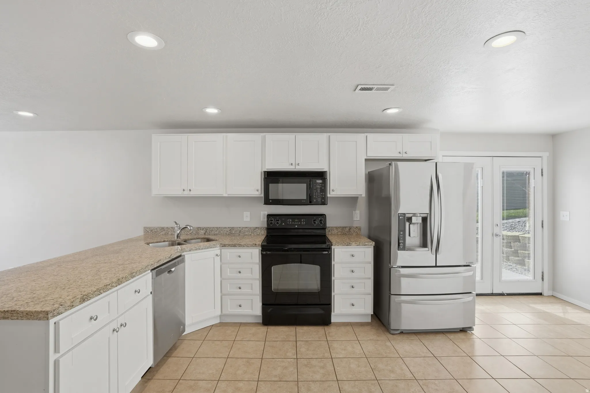 Basement full kitchen and living room