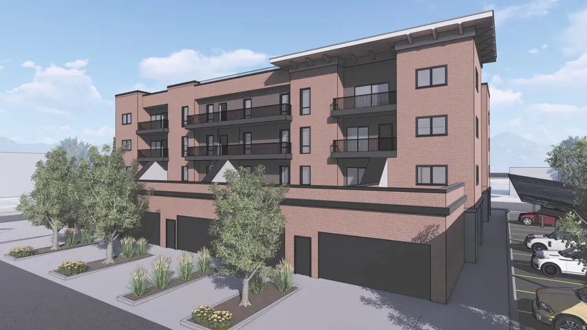Contemporary brick multi-story building featuring multiple private balconies with dark railings