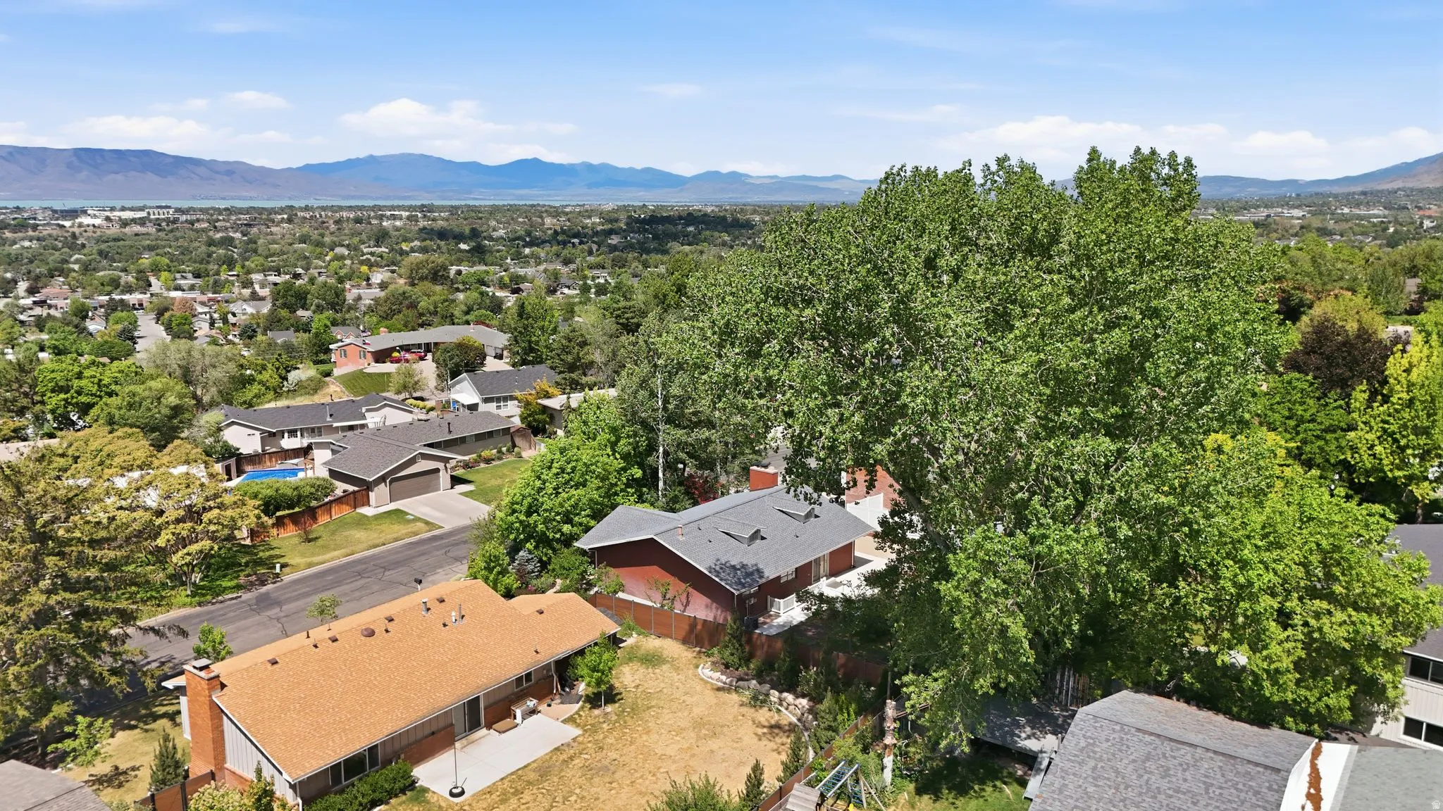 Expansive neighborhood setting with established homes and mature landscaping
