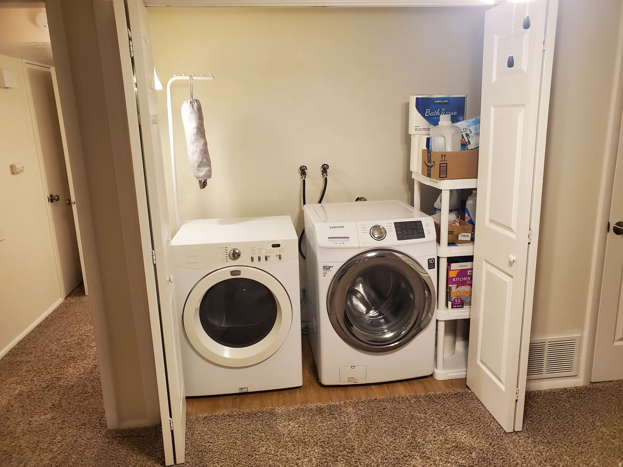 Dedicated laundry area with folding bi-fold doors